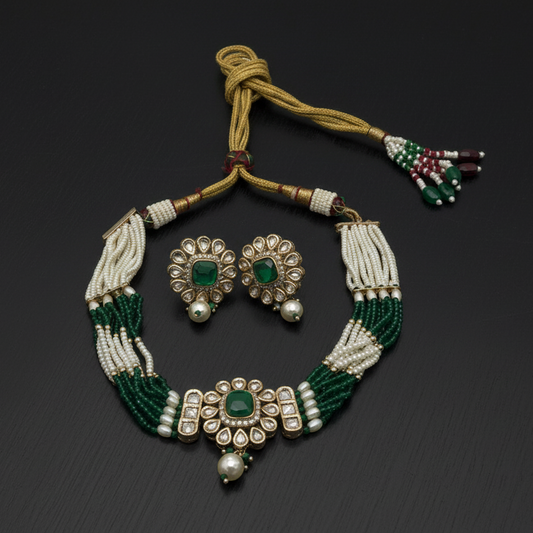 Jewelry set with necklace, earrings on a dark background