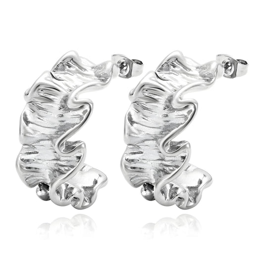 Silver earrings with a wavy design on a white background