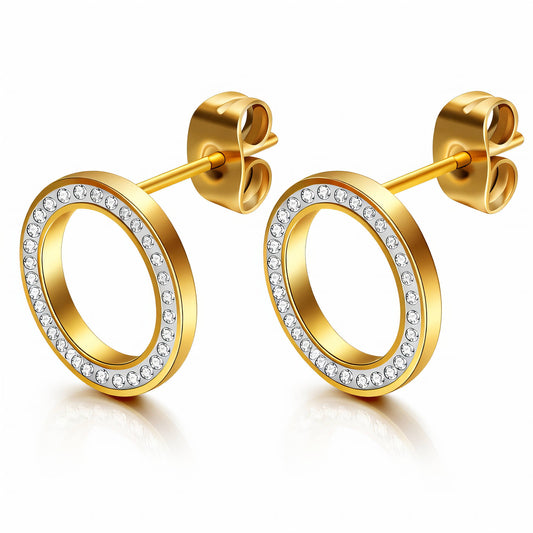 Gold hoop earrings with clear gemstones on a white background