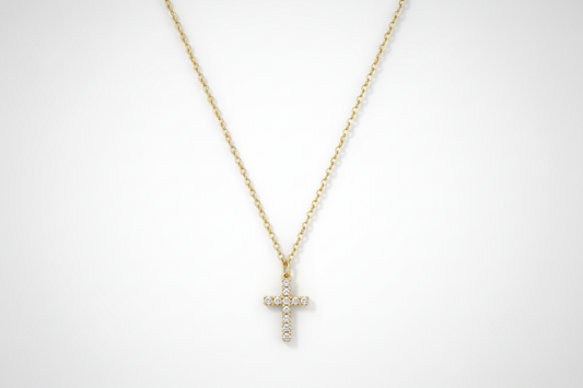 anti tarnish 18k Gold plated necklace with a cross pendant on a white background
