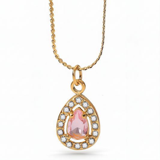 anti tarnish Gold plated necklace with a pink teardrop pendant and diamond accents on a white background