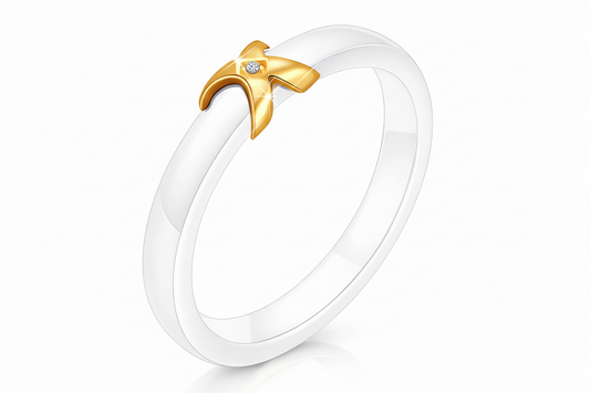 White ring with 18k gold plated anti tarnish accent on a white background