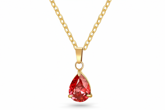 18k Gold plated anti tarnish necklace with a red teardrop-shaped gemstone pendant on a white background