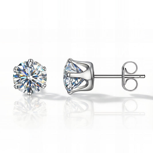 stainless steel CZ Silver stud earrings with clear gemstones on a white background