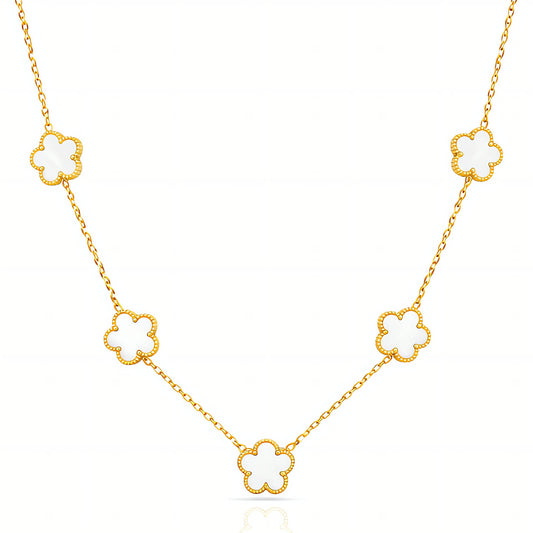 Gold necklace with clover-shaped pendants on a white background