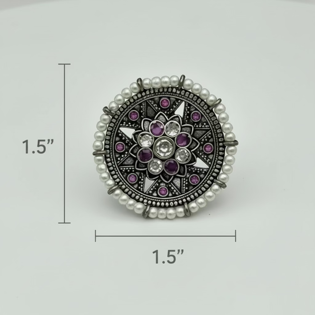 Jewelry item with decorative design and measurements on a white background
