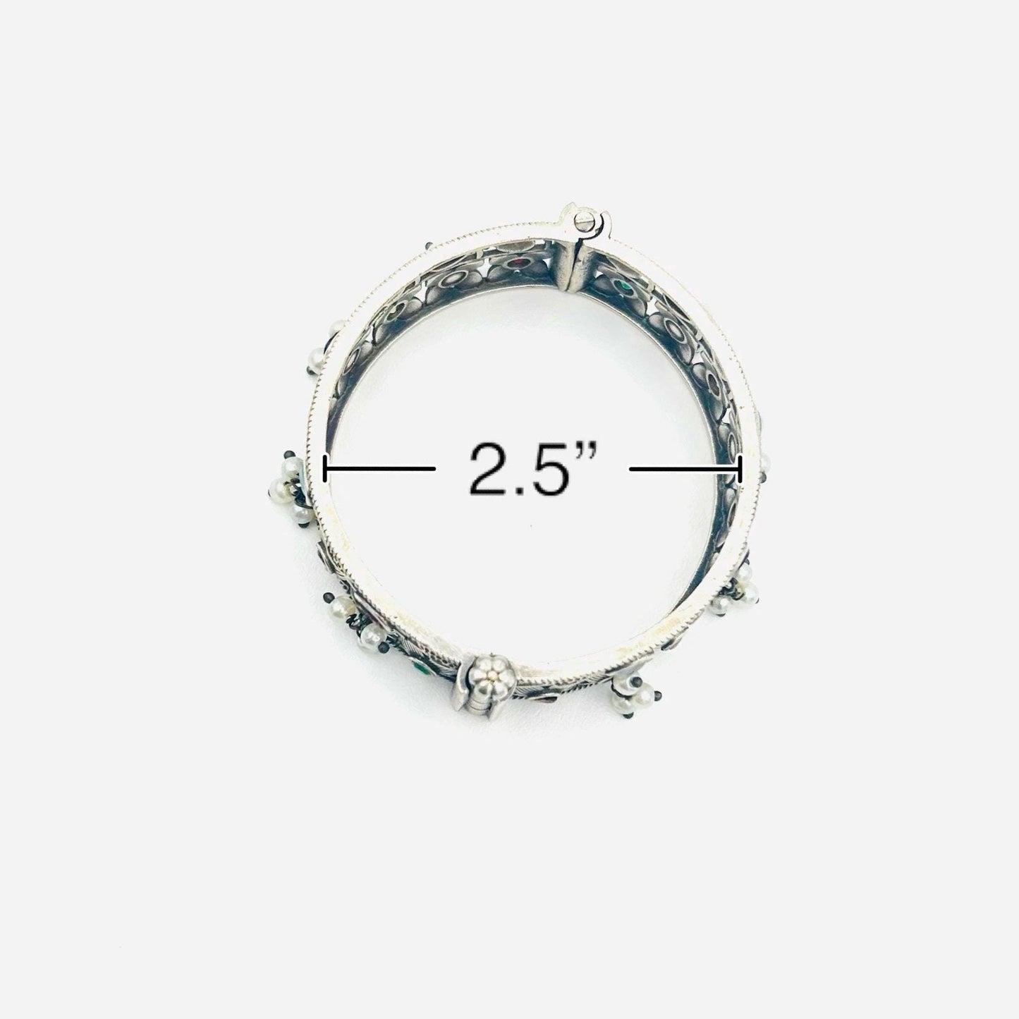 Silver ring with measurement label on a white background