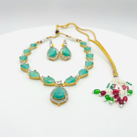 Jewelry set with turquoise stones on a white background