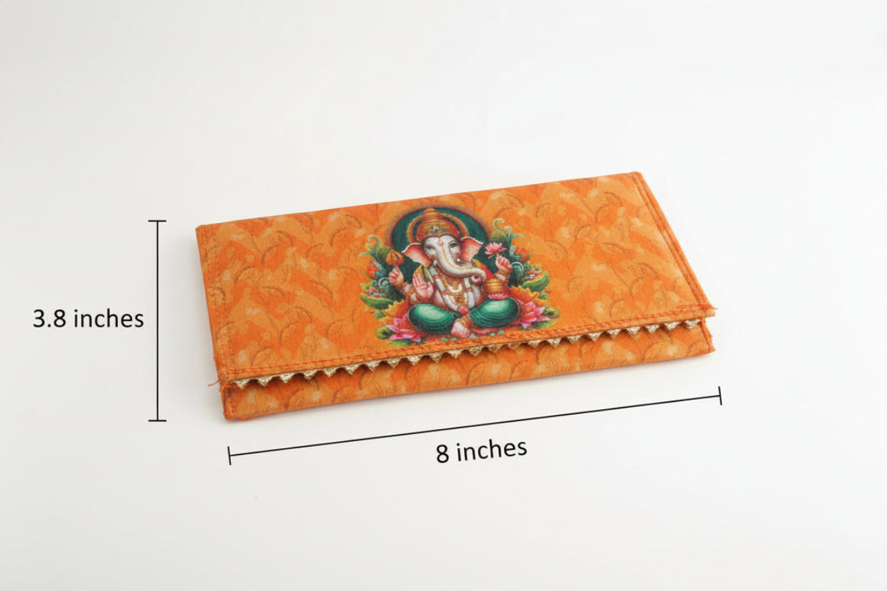 Decorative orange pouch with ganeshji design on a white background
