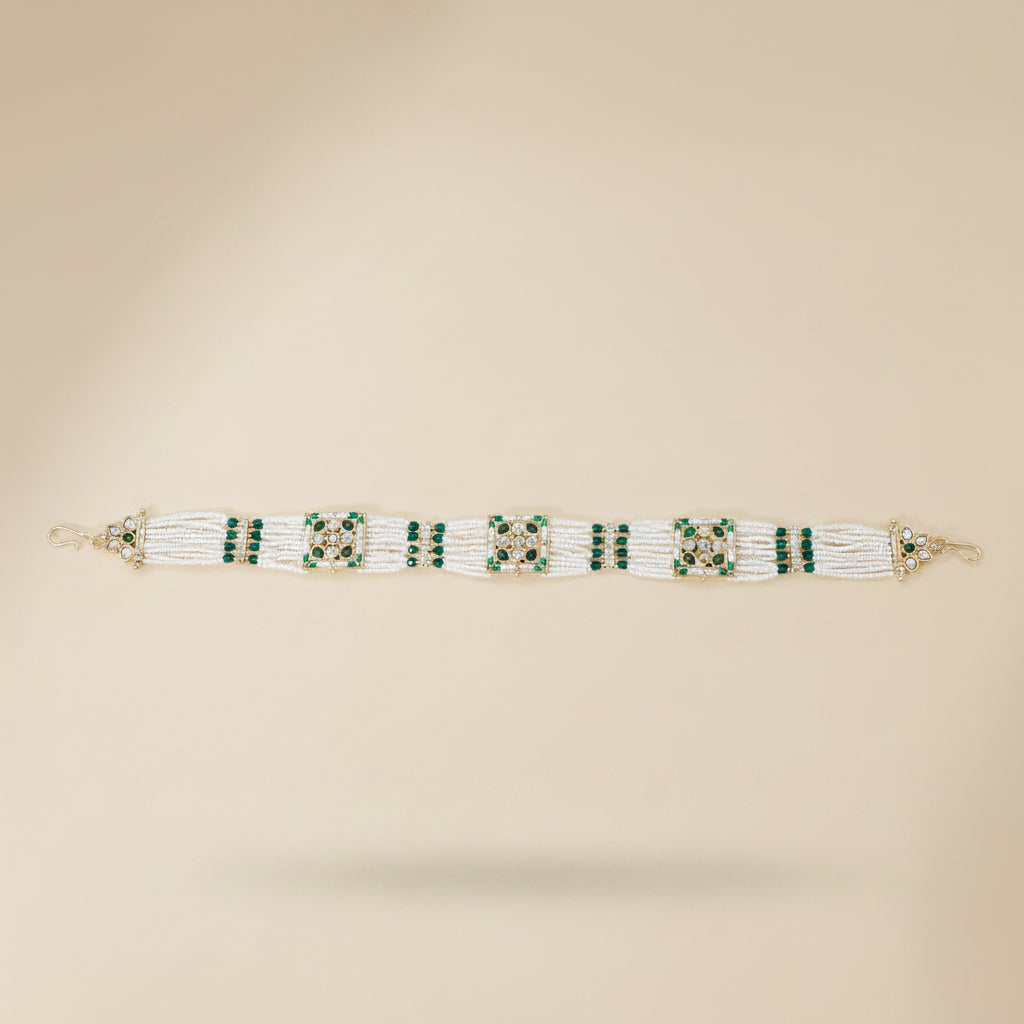 antique green pearl Beaded traditional indian Shishful on a light brown background
