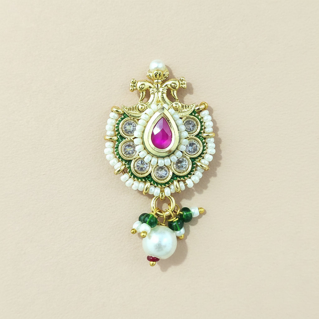 antique ruby stone nose piercing with pearl drop gemstones on a plain background