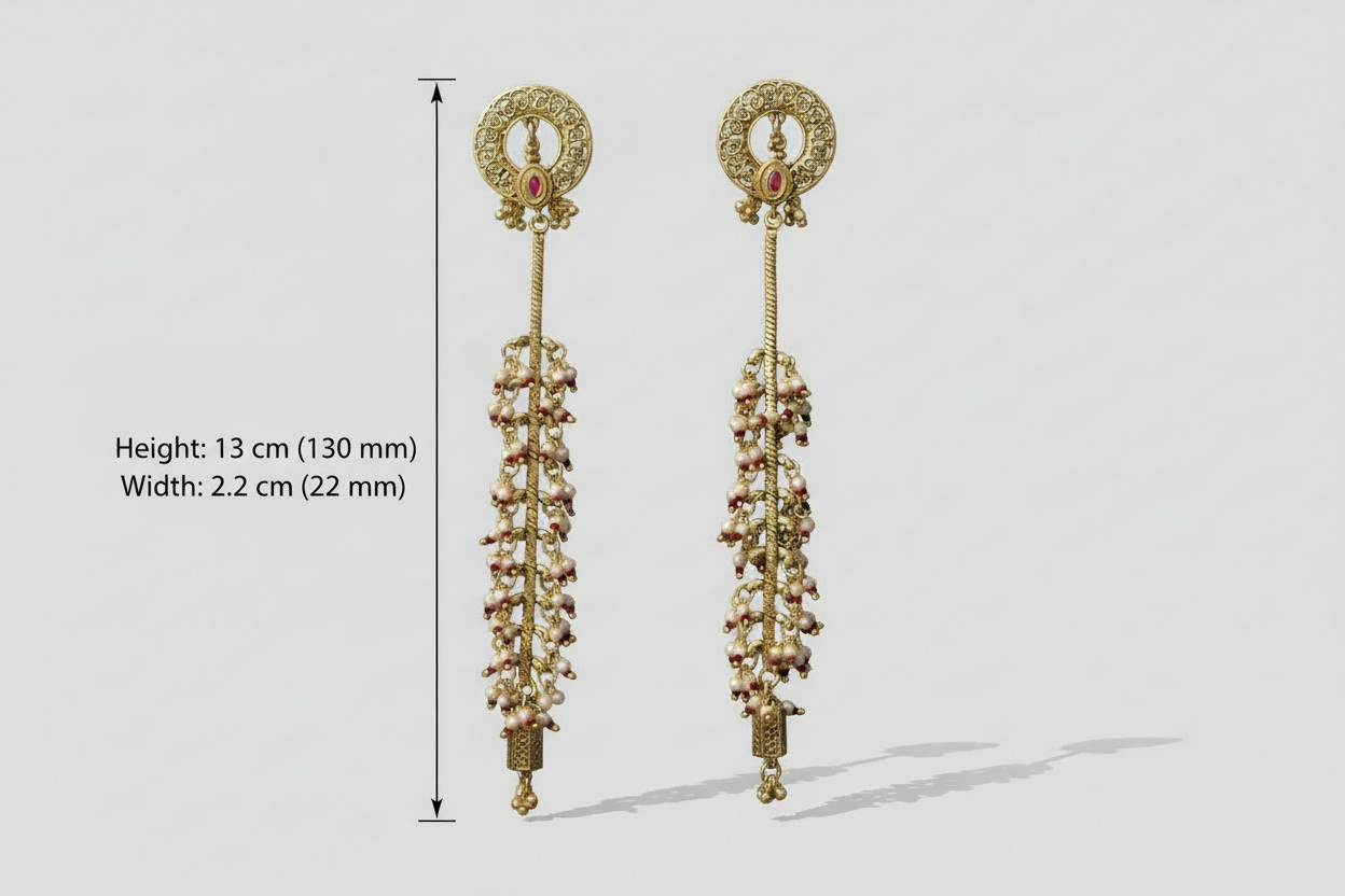 Pair of gold plated earrings with intricate designs on a light gray background