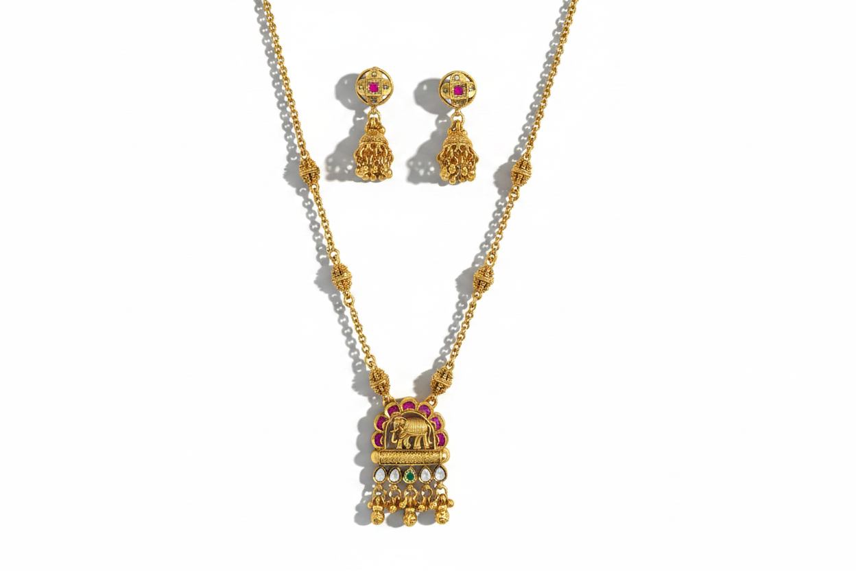 Elephant Motif Antique Pendant Set – Matte Gold Plating with Ruby & Kundan