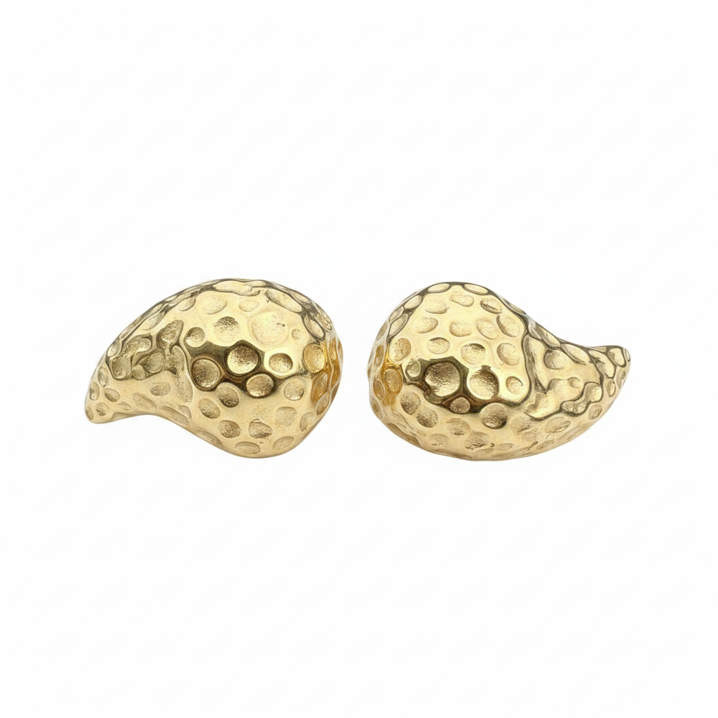 Pair of gold earrings with textured design on a white background