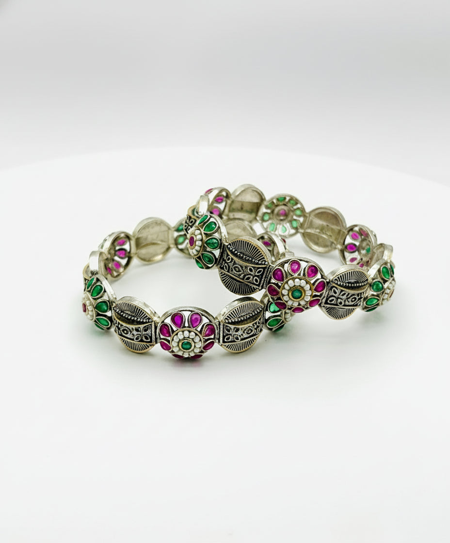 Decorative bracelet with colorful beads on a white background