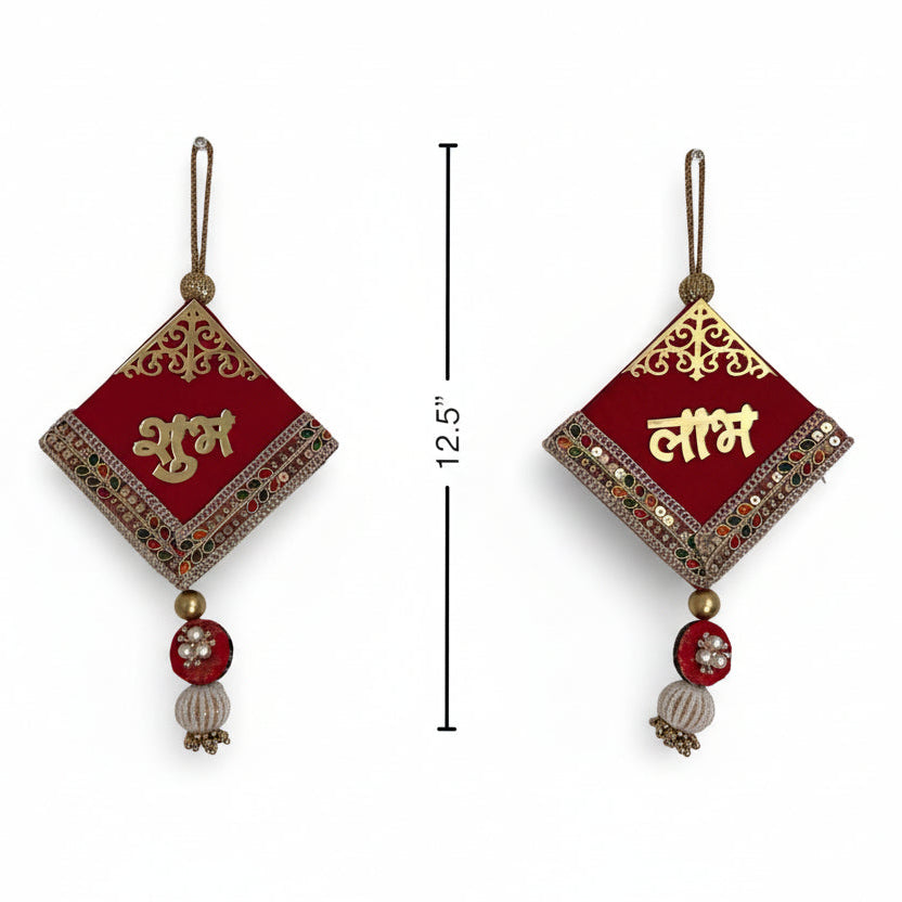 Decorative subh labh with red and gold design on a white background