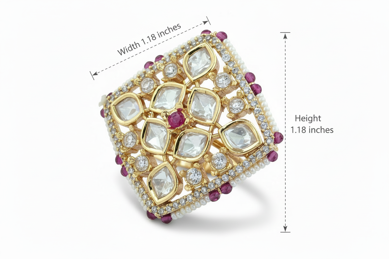 Gold plated ring with gemstones and measurements on a white background