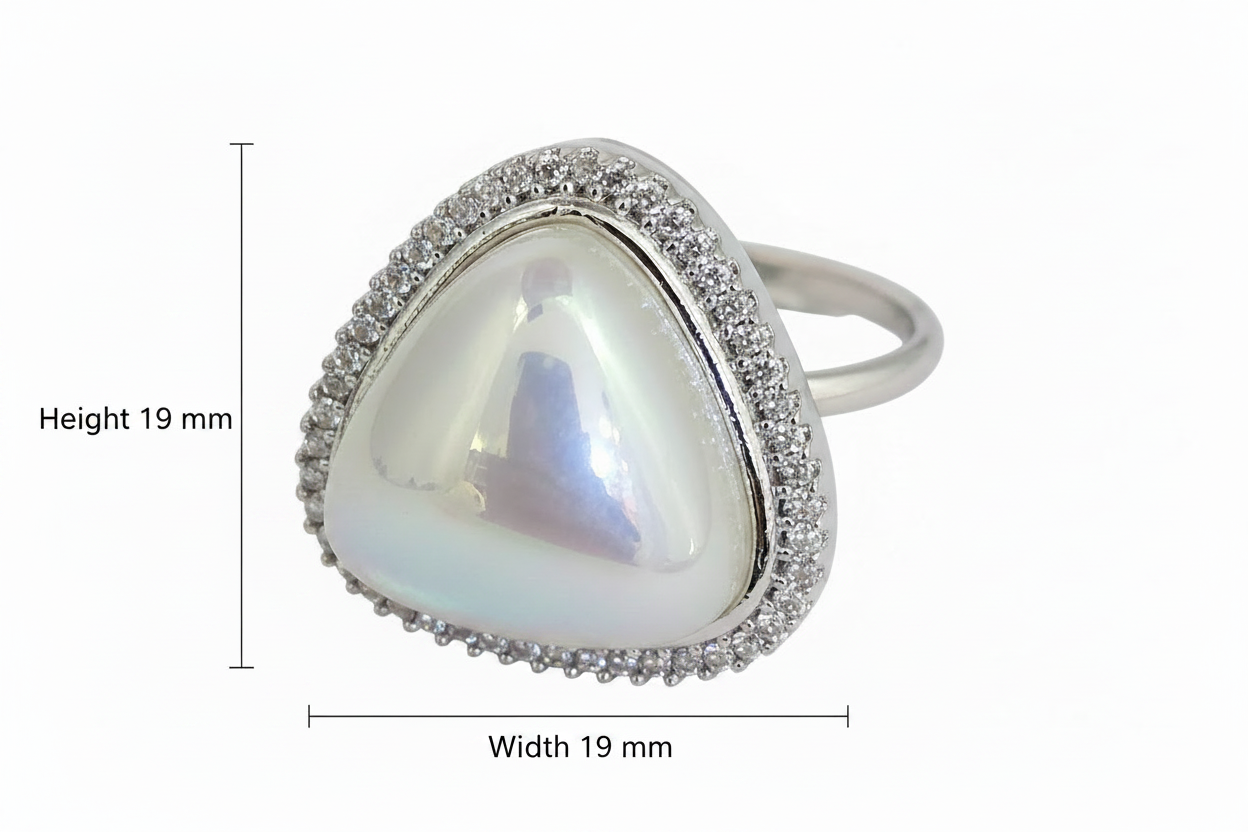 Ring with a heart-shaped gemstone and dimensions on a white background