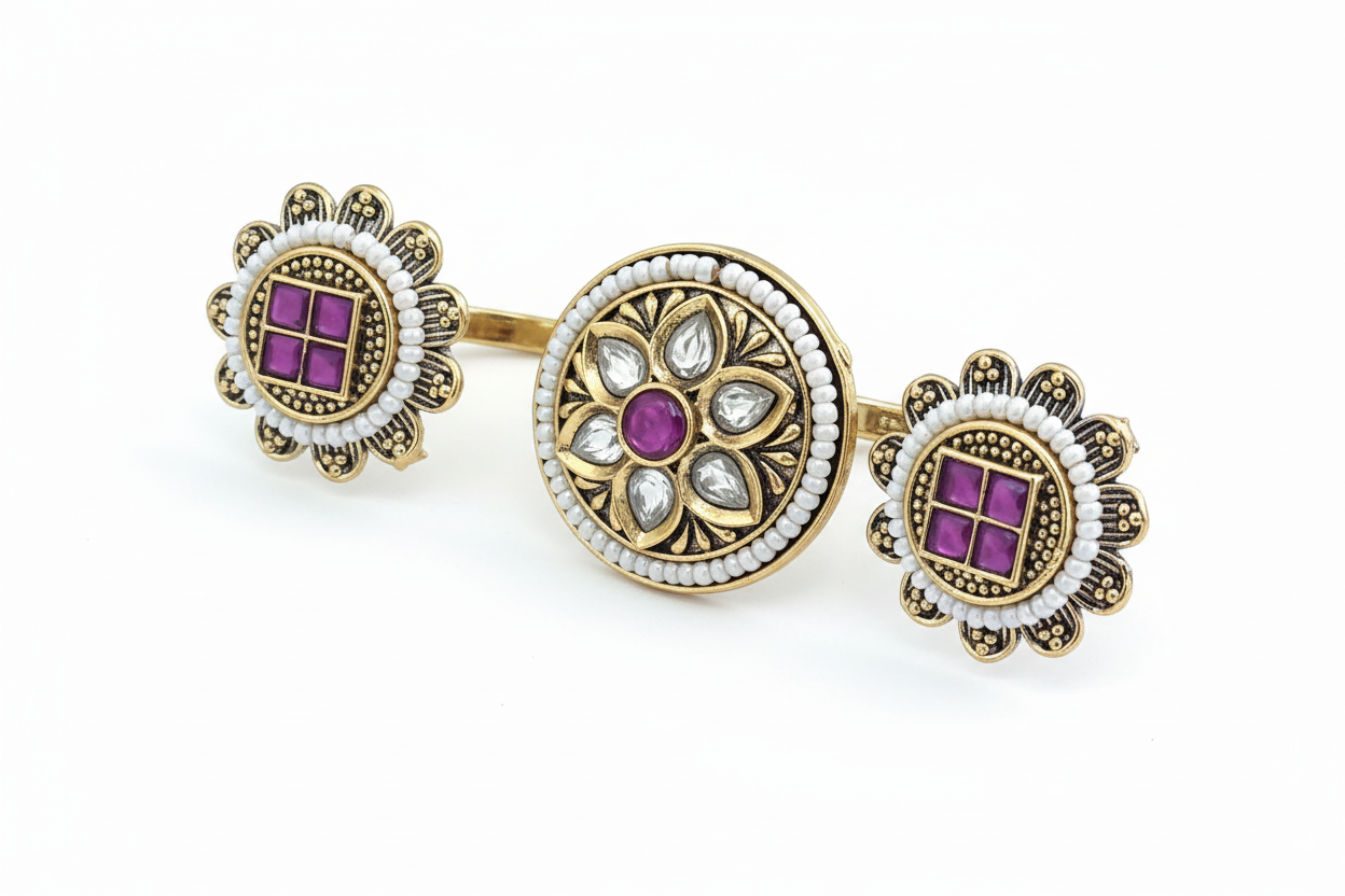double finger ring gold and purple gemstone tow finger ring on a white background
