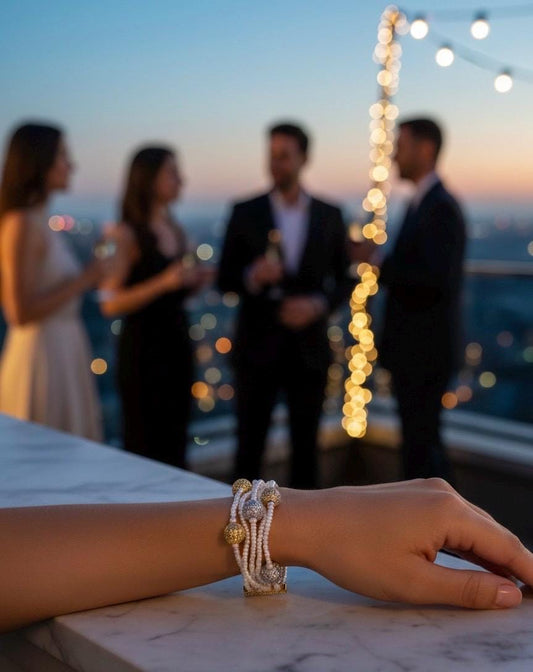 Multi-Strand Pearl Bracelet with Two-Tone Pave Crystal Ball Charms
