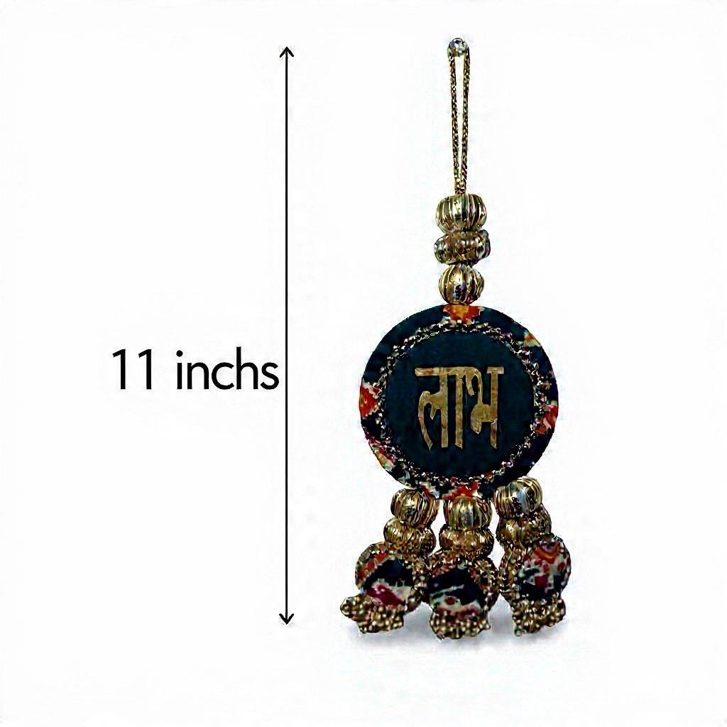 Decorative hanging ornament with text on a white background