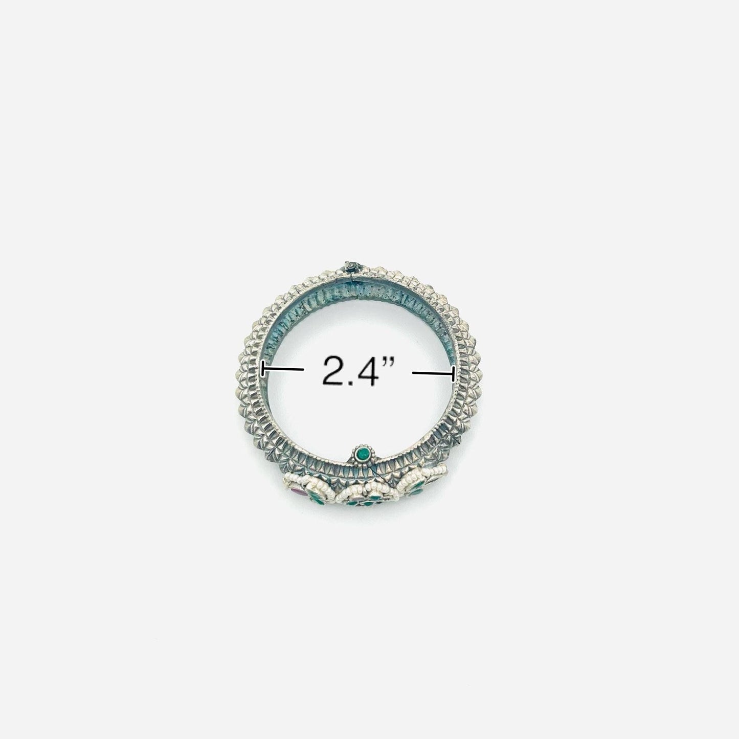 Decorative ring with measurement label on a white background