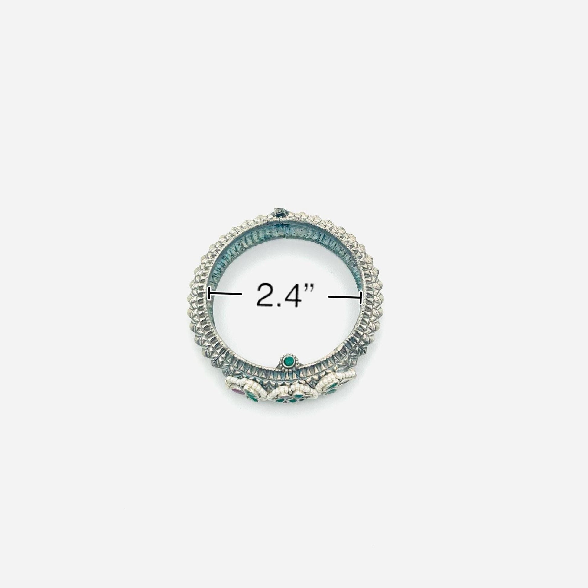 Decorative ring with measurement label on a white background