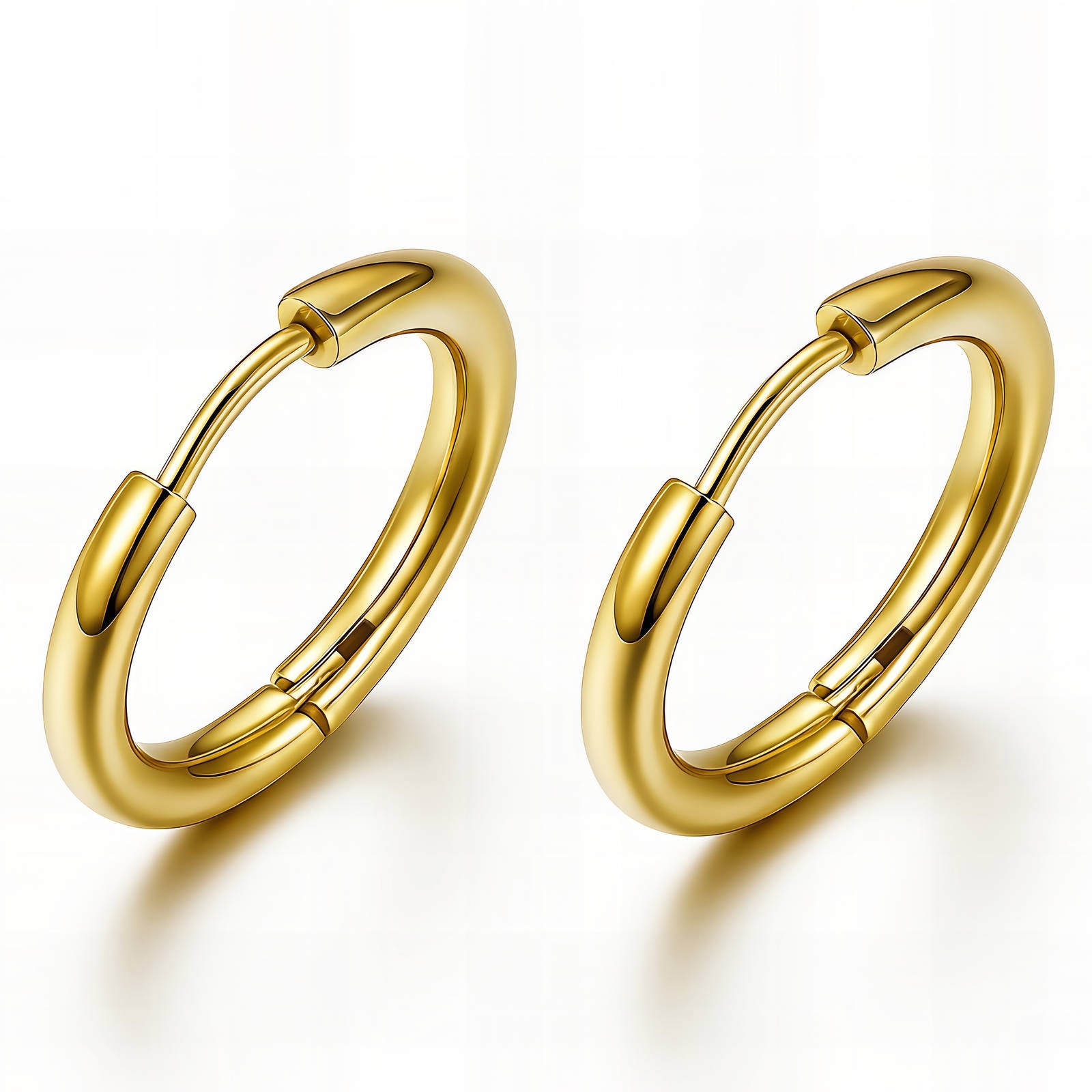 18k gold plated Pair of gold hoop earrings on a white background