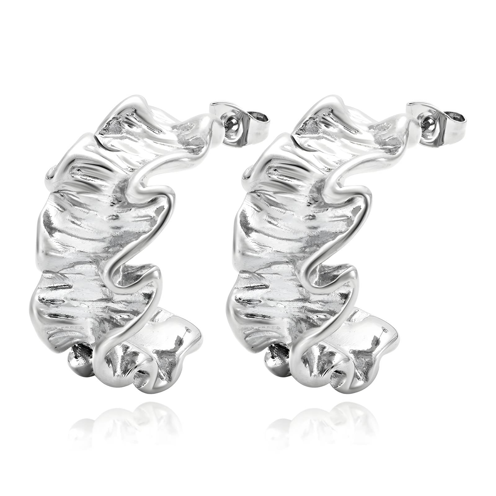 Silver earrings with a wavy design on a white background