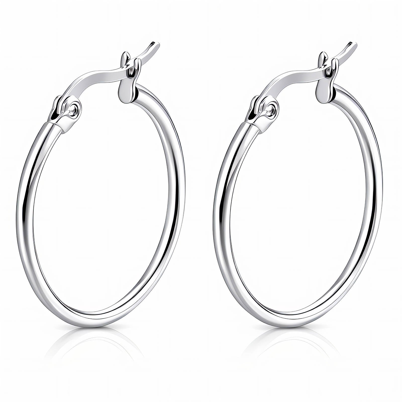 Pair of stainless steel silver hoop earrings on a white background