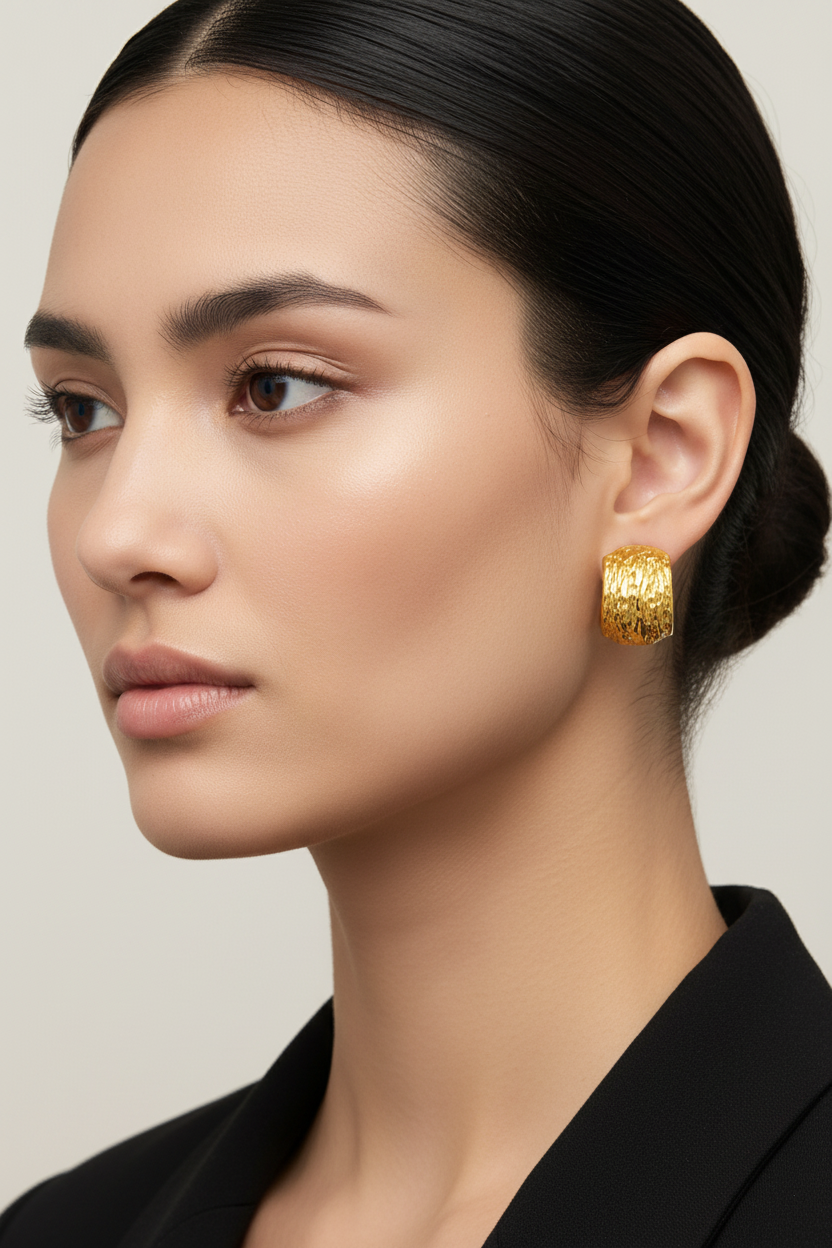 women wearing 18k plated Gold hoop earrings on a white background