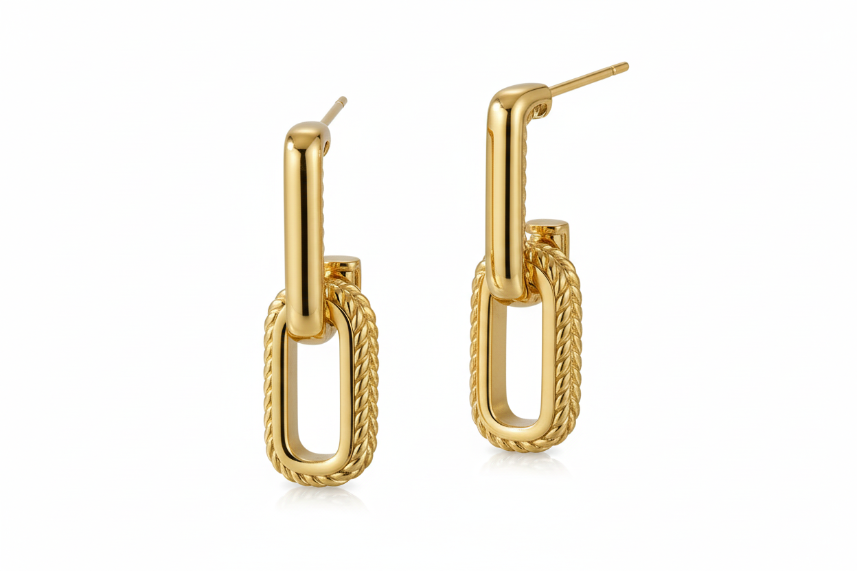 Gold hoop earrings on a white background