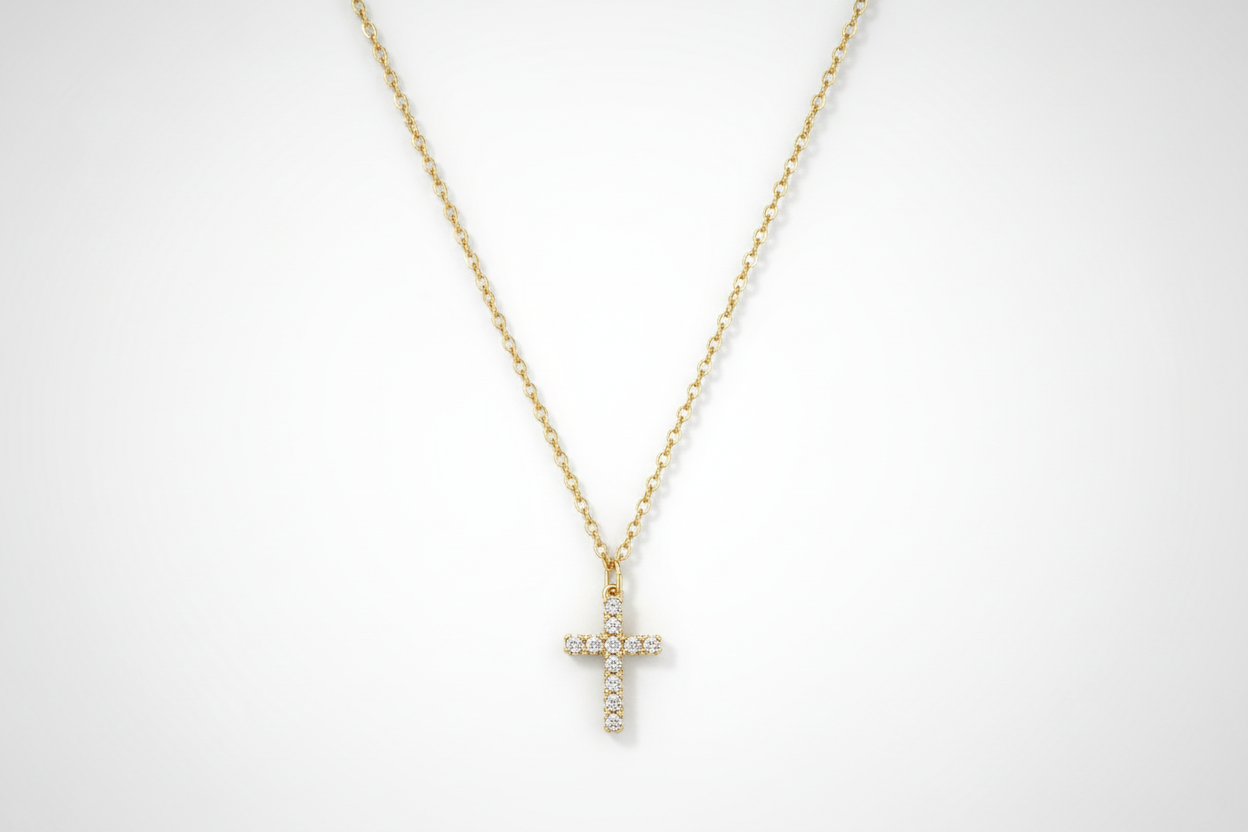 anti tarnish 18k Gold plated necklace with a cross pendant on a white background