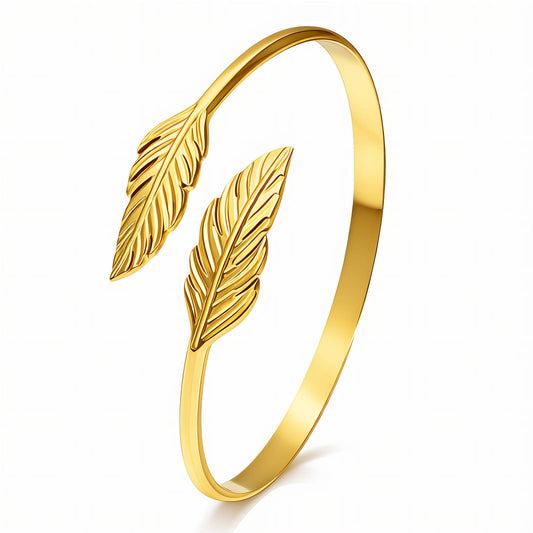 anti tarnish Gold plated bracelet with leaf designs on a white background