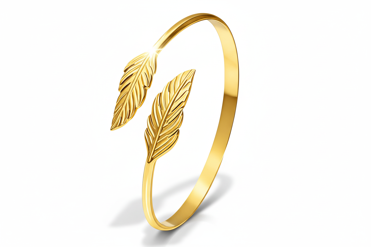 water proof Gold plated cuff bracelet with leaf designs on a white background