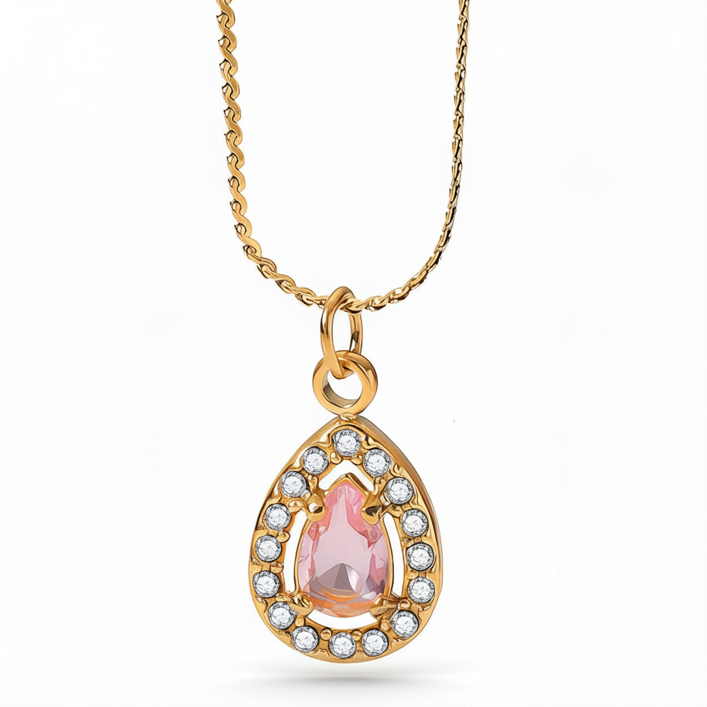 anti tarnish Gold plated necklace with a pink teardrop pendant and diamond accents on a white background
