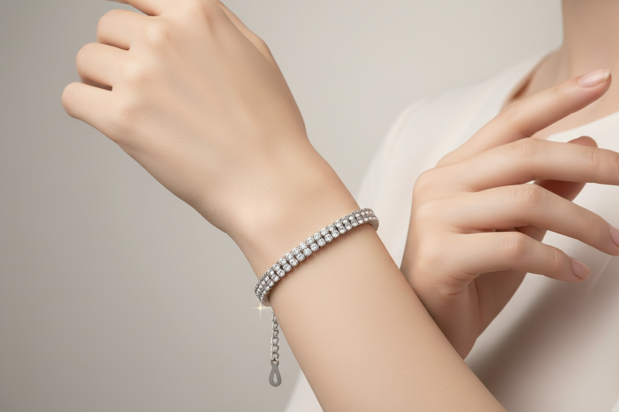 stainless steel Silver bracelet on a wrist with a neutral background