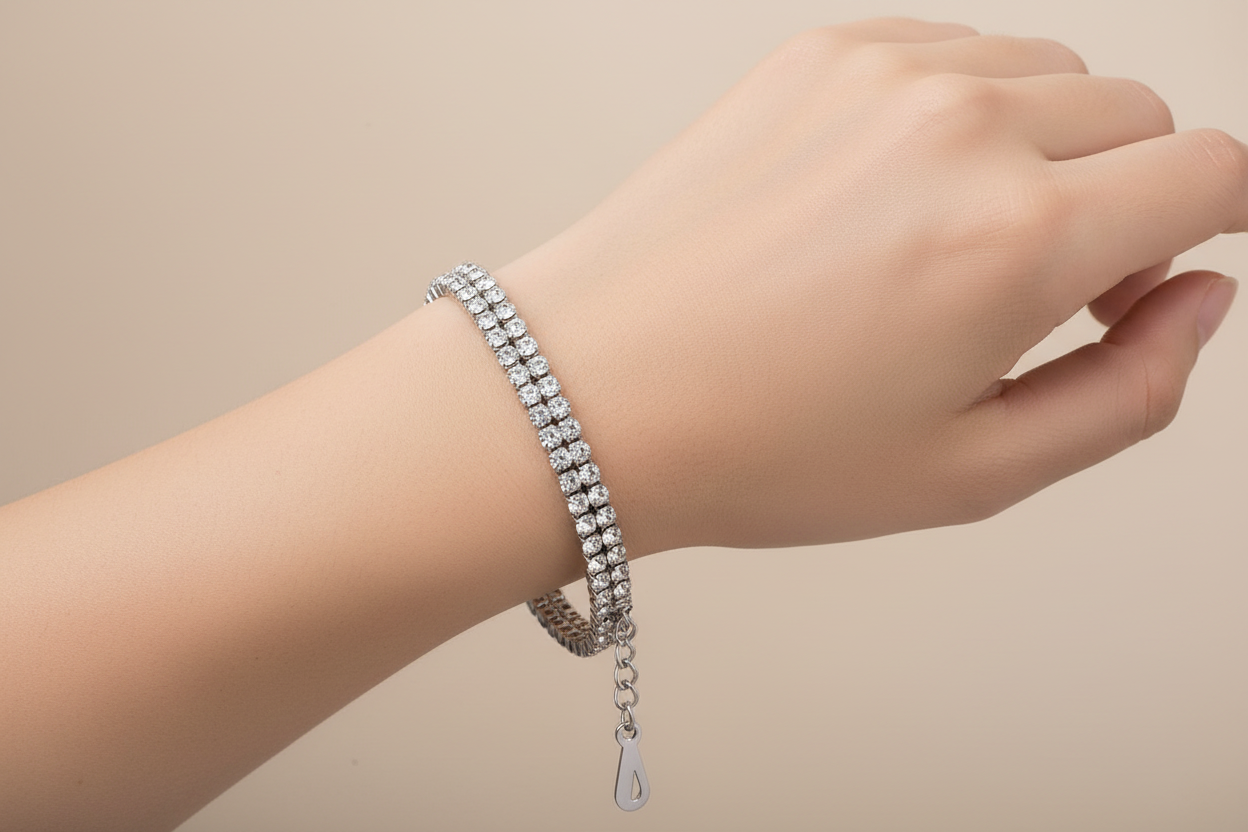 stainless steel Tennis Bracelet women wearing on a wrist against a beige background