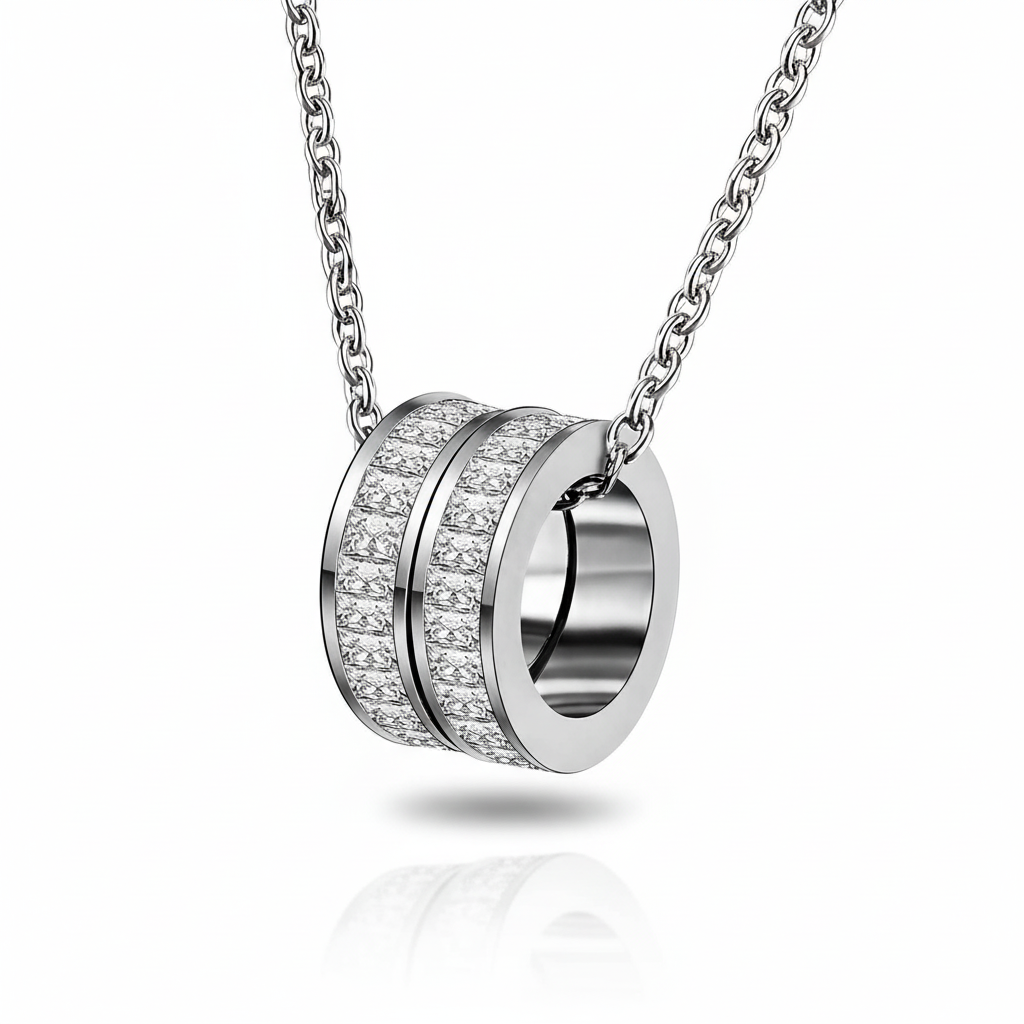 Silver stainless steel necklace with a circular pendant on a white background