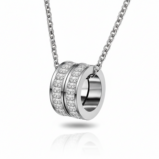 Silver stainless steel necklace with a circular pendant on a white background