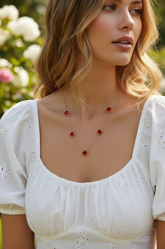 Woman wearing a delicate Red Clover Station Necklace