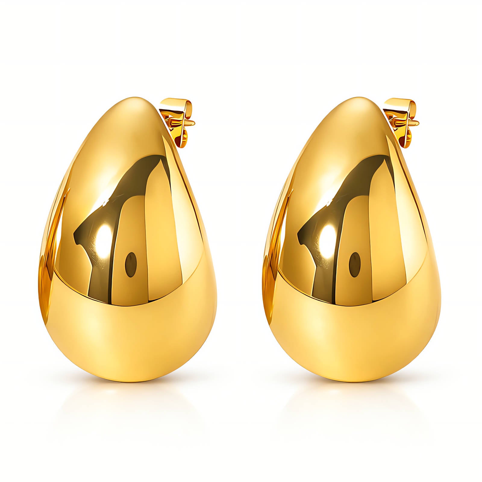 Pair of gold hoop earrings on a white background