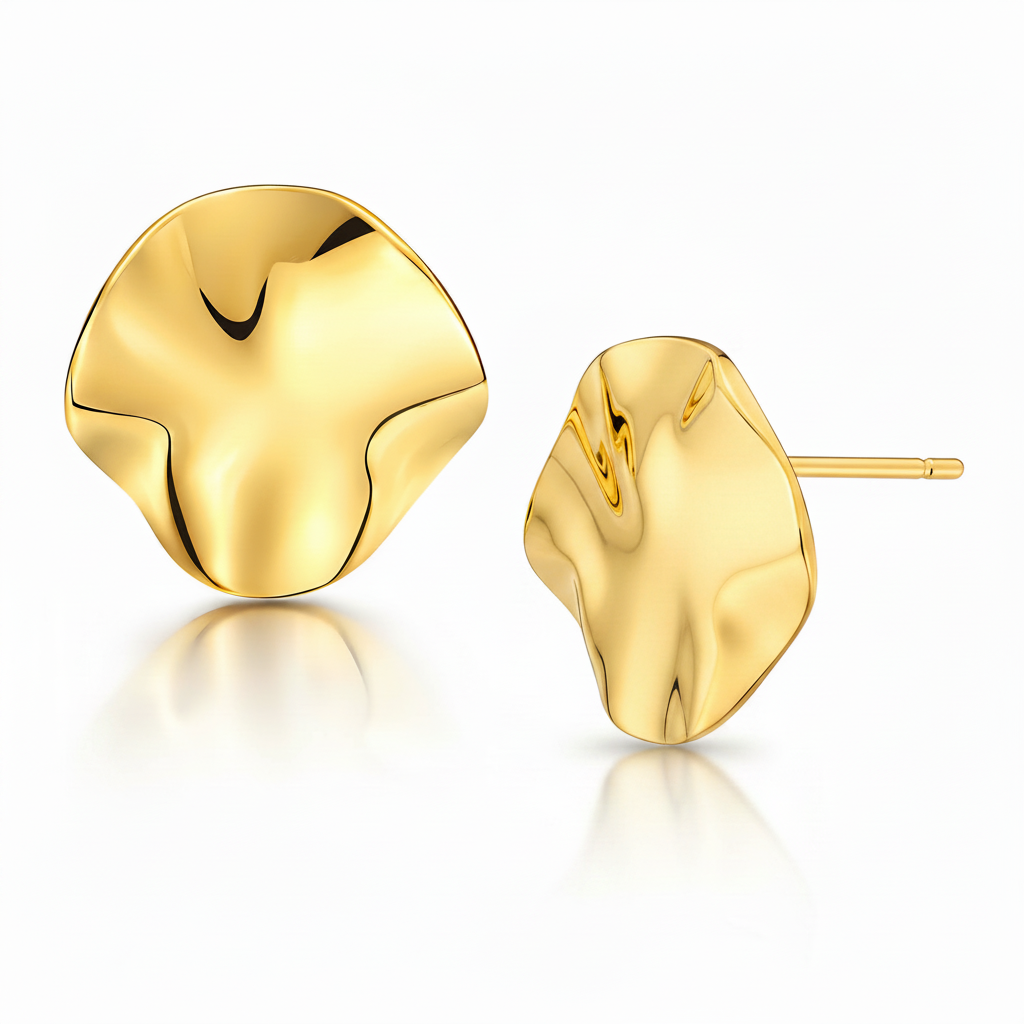 Gold earrings on a white background