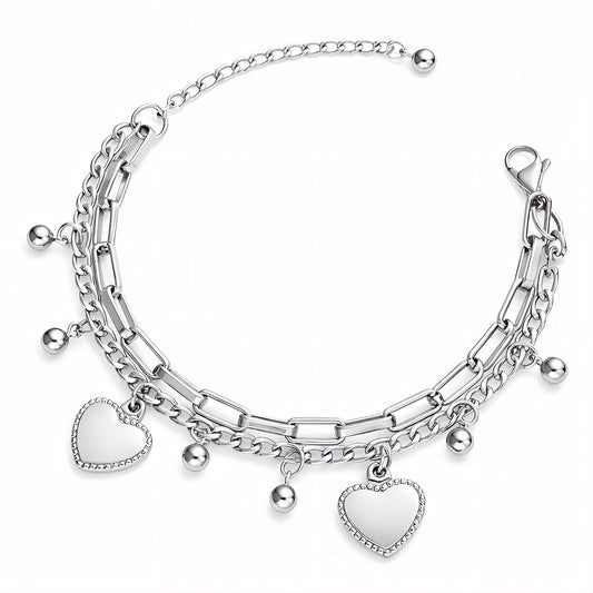 Silver bracelet with heart charms on a white background