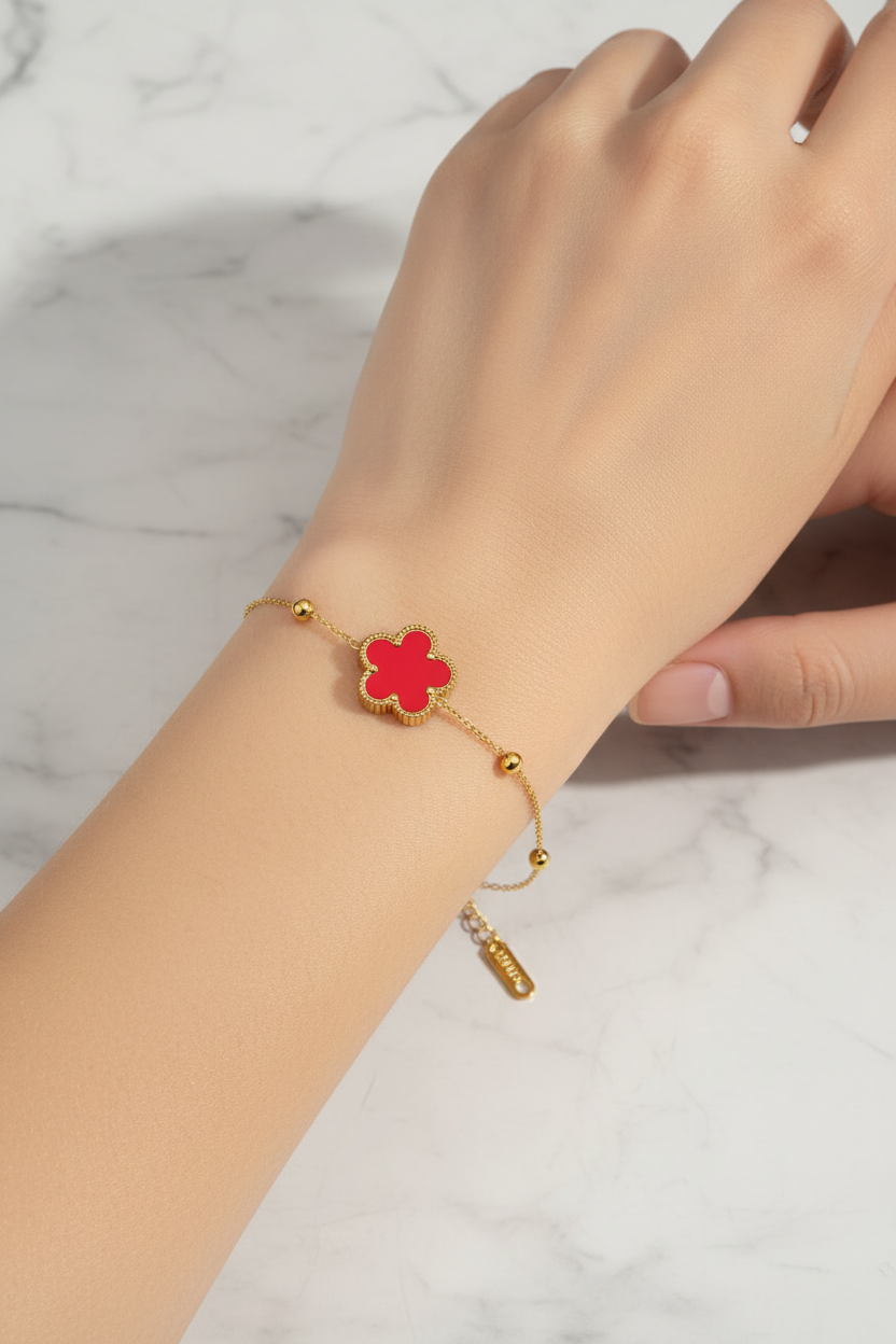 18k Gold plated bracelet with a red flower charm women wearing 