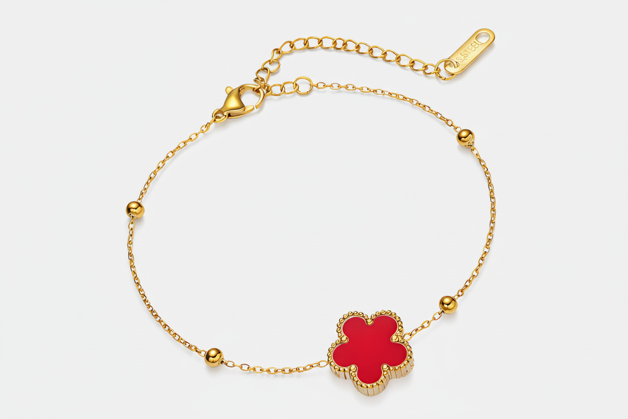 red clover charm 18k Gold plated bracelet on a white background