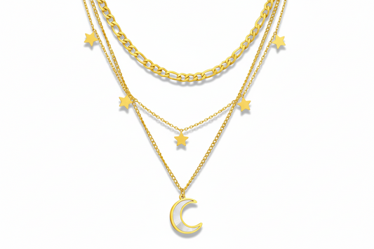 18k gold plated Gold necklace with star and moon pendants on a white background