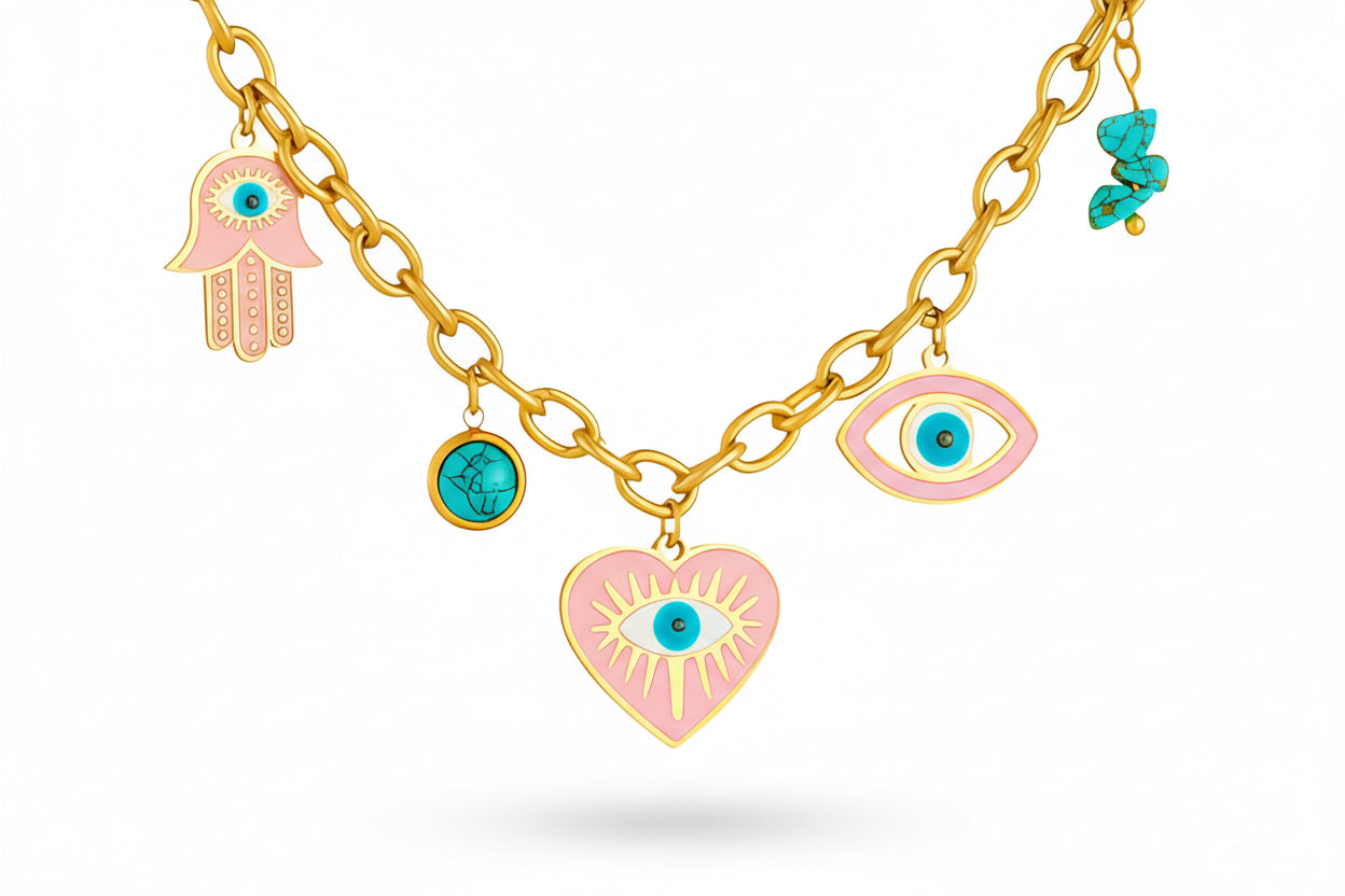 18k Gold plated chain bracelet with charms including a pink hamsa hand, turquoise circle, and pink heart with eye design on a white background.