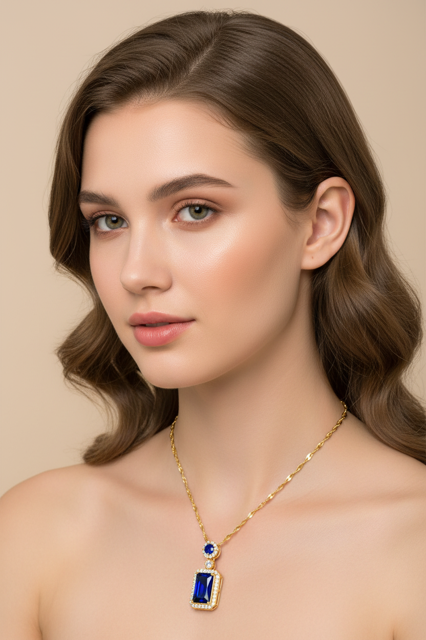 Woman wearing a gold necklace with a blue pendant on a beige background