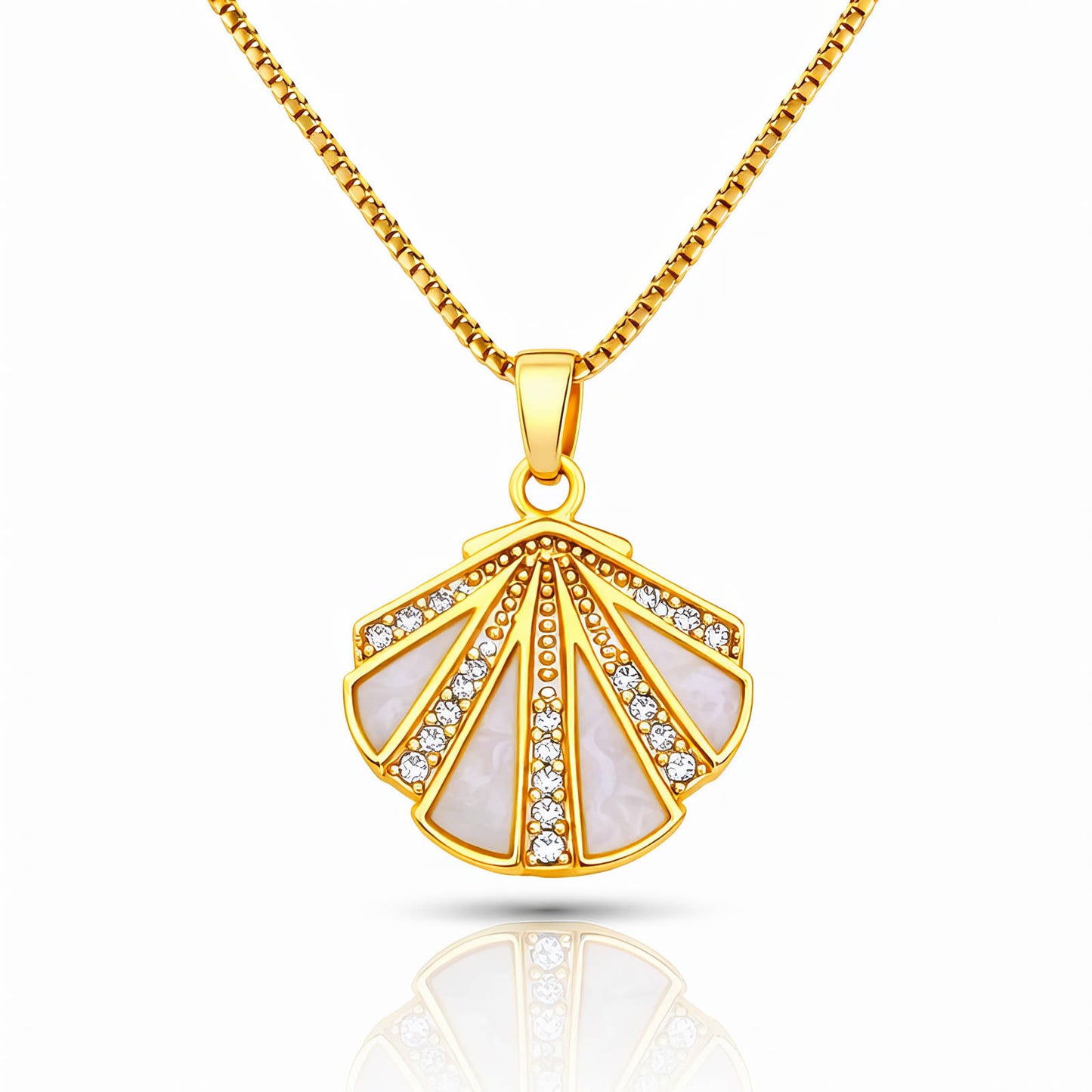 Gold necklace with a shell-shaped pendant on a white background